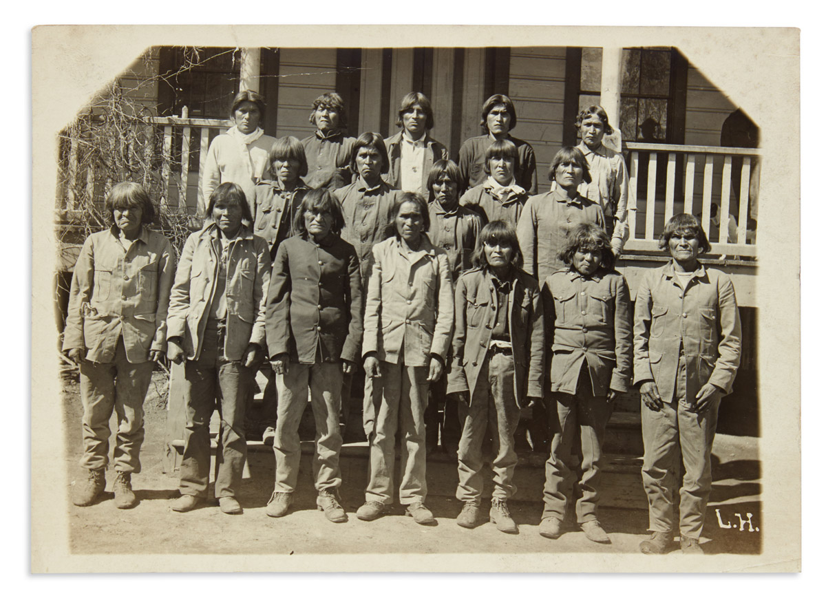 (AMERICAN INDIANS--PHOTOGRAPHS.) Photograph believed to depict Geronimo and other Apache prisoners.